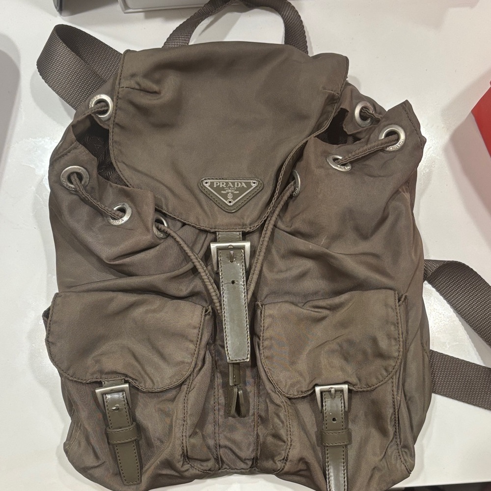 Unisex Green Prada Backpack with Silver Accents